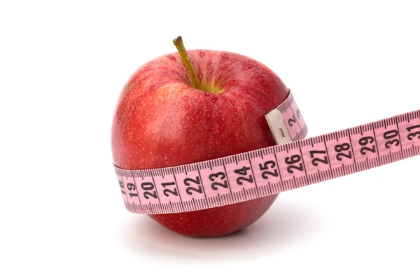 Jablko s páskou opatření. koncept zdravého životního stylu. — Stock fotografie