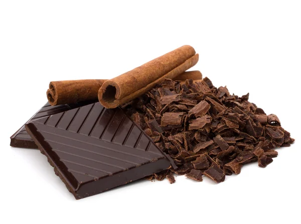 Chocolate bars and cinnamon sticks — Stock Photo, Image