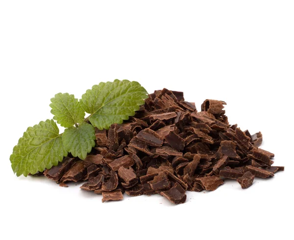 Crushed chocolate shavings pile and mint leaf — Stock Photo, Image