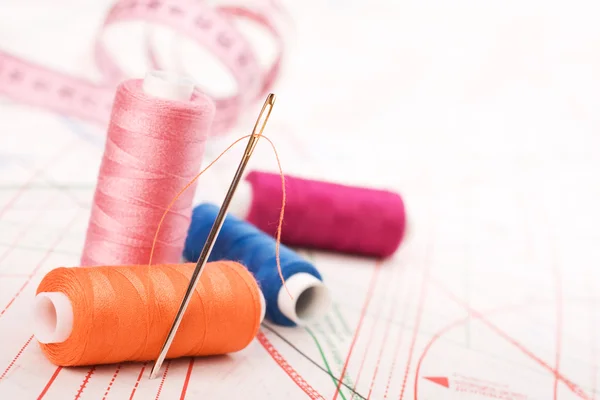 stock image Spool of thread and needle. Sew accessories.