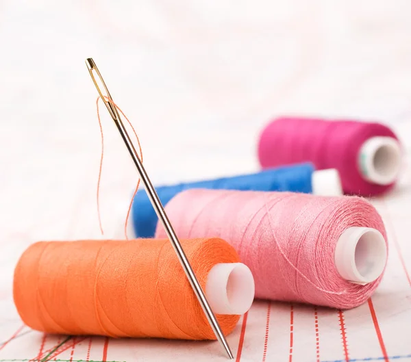 Spool of thread and needle. Sew accessories. Stock Photo by ©natika ...