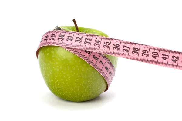Äpple med måttband. hälsosam livsstilskoncept. — Stockfoto