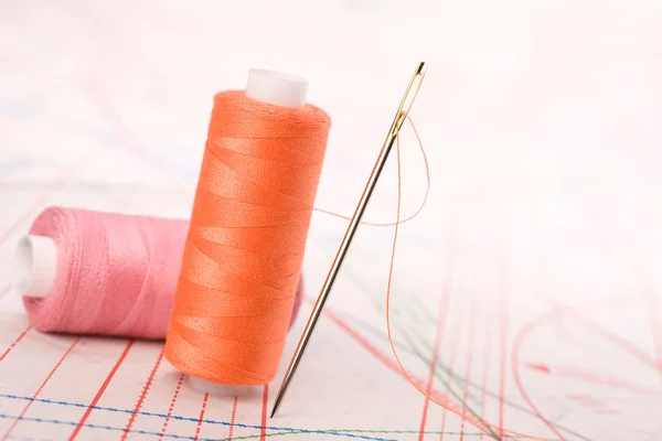 stock image Spool of thread and needle. Sew accessories.