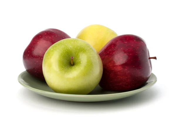 Jabłka kupie na talerzu — Zdjęcie stockowe
