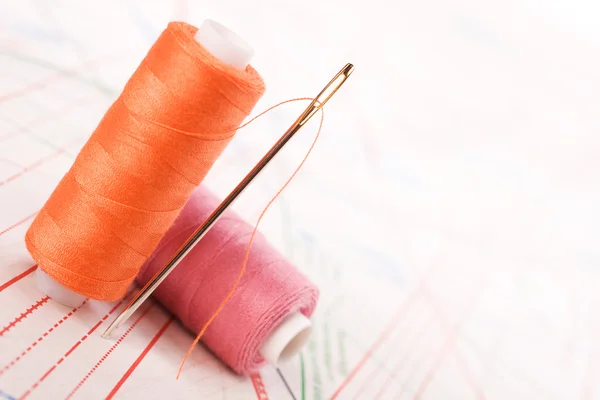 Stock image Spool of thread and needle. Sew accessories.