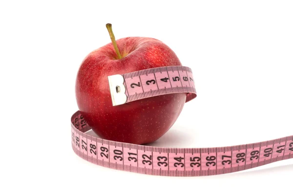 巻尺とアップル。健康的なライフ スタイルのコンセプト. — ストック写真