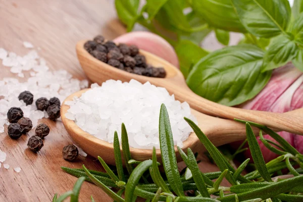 stock image Fresh herbs and salt spoon