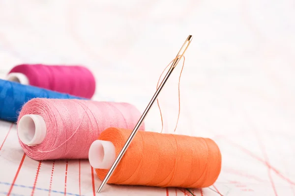 stock image Spool of thread and needle. Sew accessories.