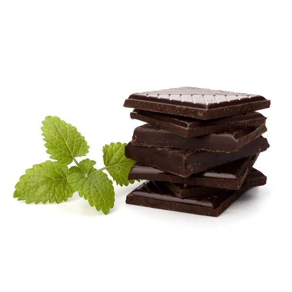 Chocolate bars stack and mint leaf — Stock Photo, Image