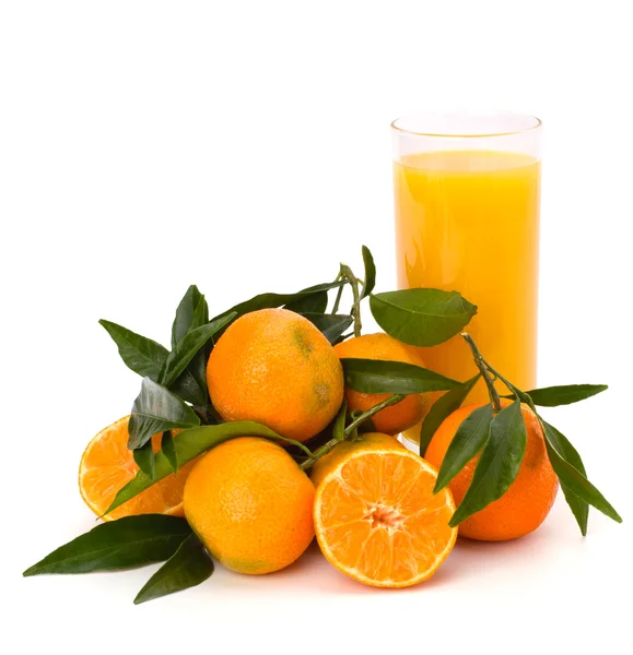 Tangerines and juice glass — Stock Photo, Image