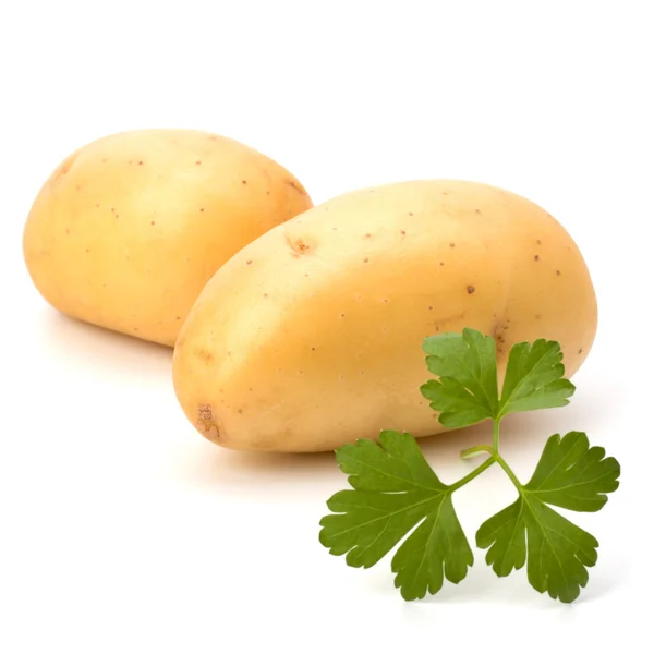 Новый картофель и зеленая петрушка — стоковое фото
