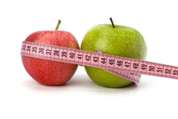 Manzana con cinta métrica. concepto de estilo de vida saludable . — Foto de Stock