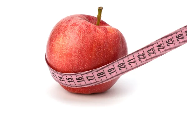 巻尺とアップル。健康的なライフ スタイルのコンセプト. — ストック写真
