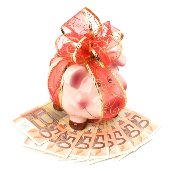 Christmas deposit concept. Piggy bank with festive bow isolated — Stock Photo, Image