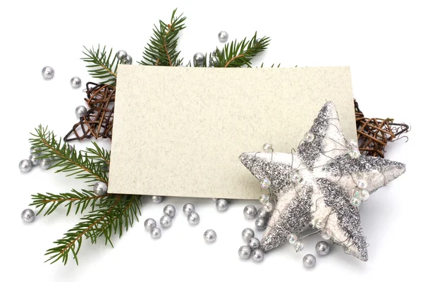 Різдвяні прикраси з вітальною листівкою ізольовані на білому фоні — стокове фото