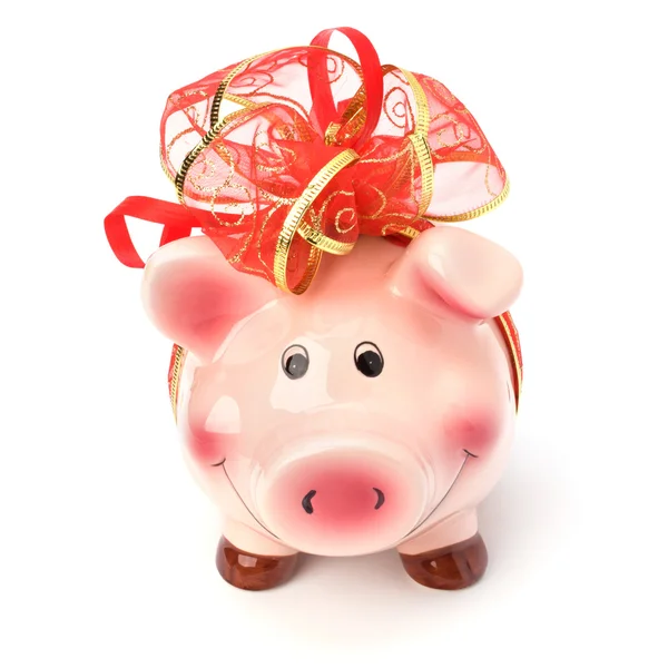 stock image Christmas deposit concept. Piggy bank with festive bow isolated