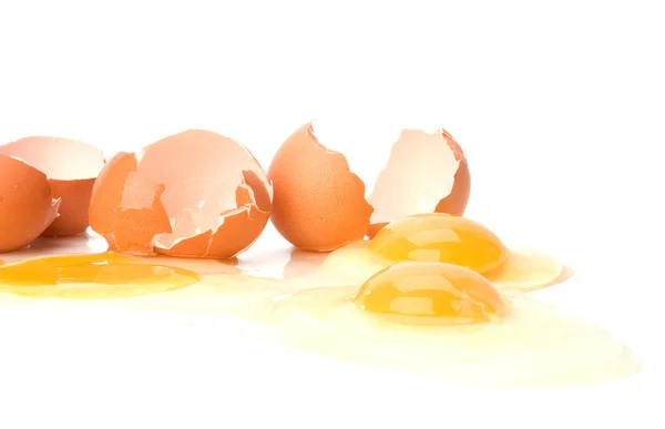 stock image Broken eggs isolated on white background