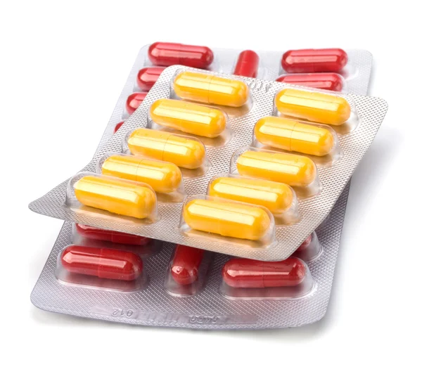 stock image Medical capsules isolated on white