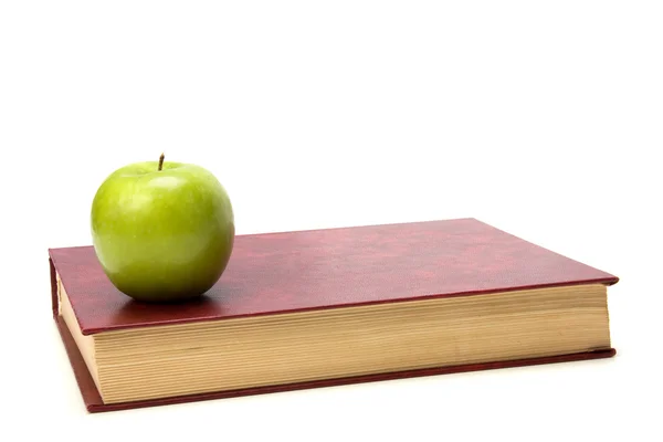 Βιβλίο με την apple που απομονώνονται σε λευκό φόντο — Φωτογραφία Αρχείου