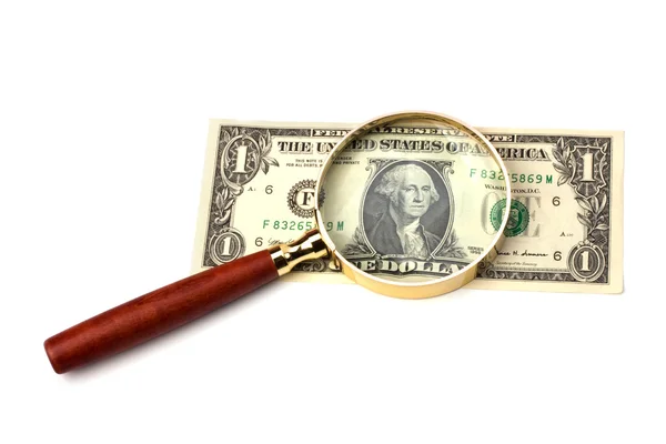 stock image Hand magnifier over banknote isolated on white background