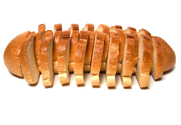 Sliced baguette isolated on white — Stock Photo, Image