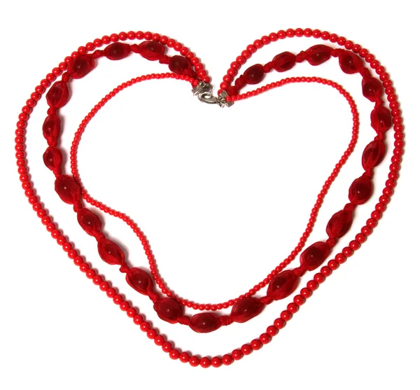 Red necklace in heart shape isolated on white background — Stock Photo, Image