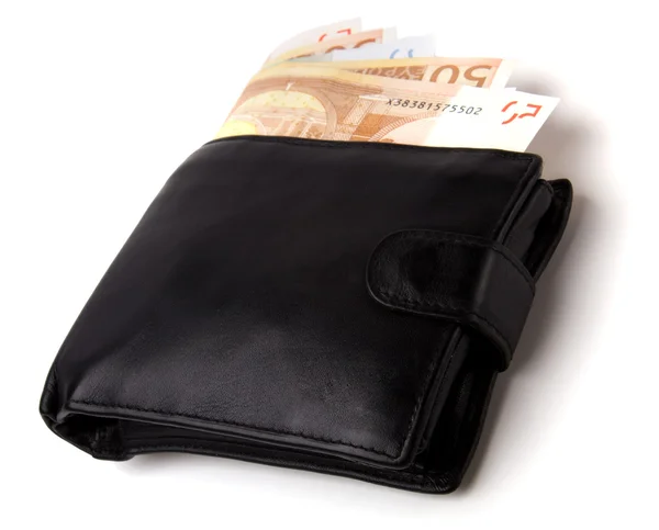 Гроші в шкіряному гаманці ізольовані на білому тлі — стокове фото
