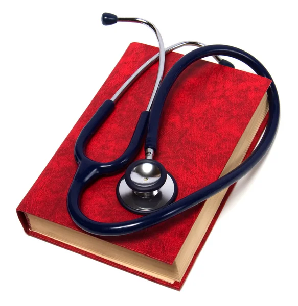 Stetoskop izole beyaz zemin üzerine kırmızı kitap — Stok fotoğraf