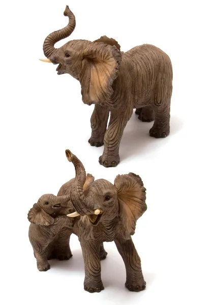 Ceramics elephant with elephant calf isolated on white backgroun Royalty Free Stock Images