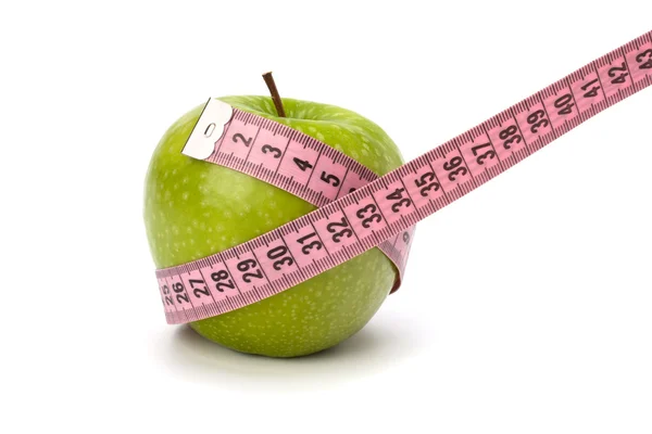 Manzana con cinta métrica. concepto de estilo de vida saludable . Imágenes De Stock Sin Royalties Gratis