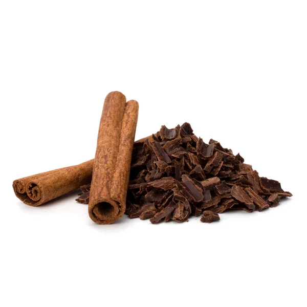 stock image Crushed chocolate shavings pile and cinnamon sticks