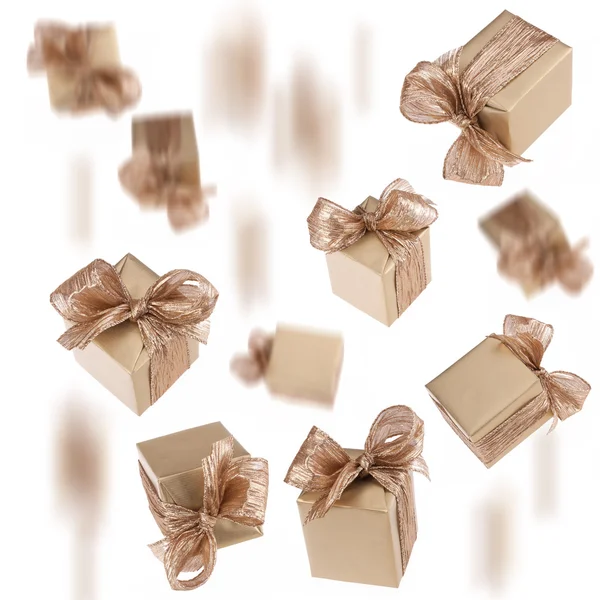 Flying gold gifts background — Stock Photo, Image