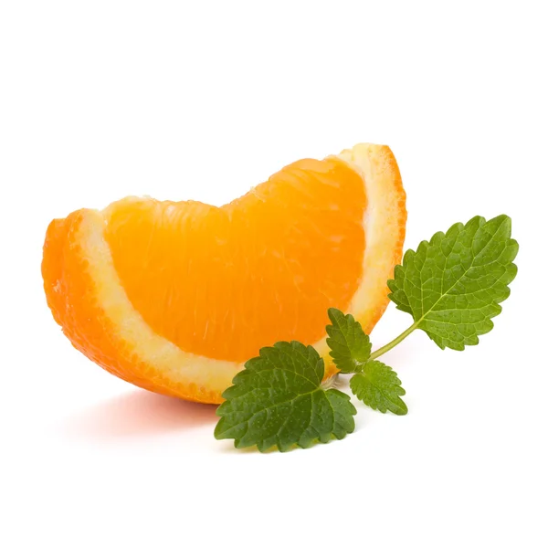 Orange fruit segment and citron mint leaf — Stock Photo, Image