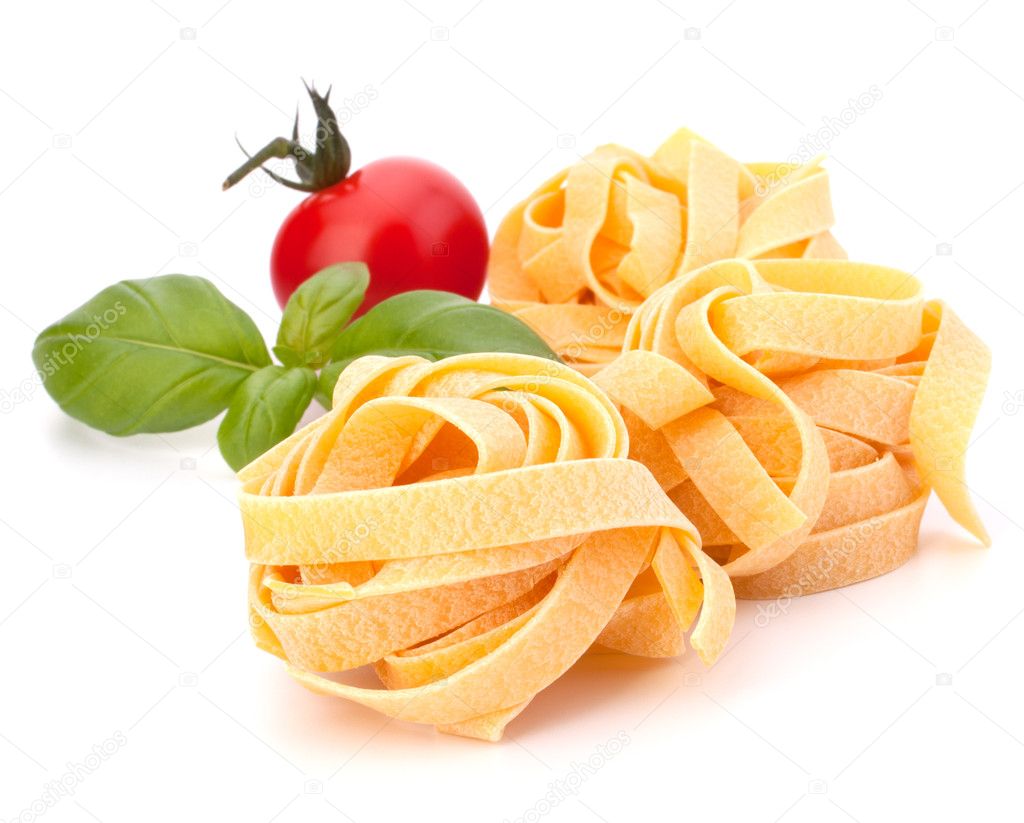 Italian pasta fettuccine nest and cherry tomato