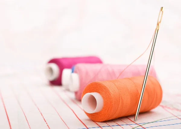 stock image Spool of thread and needle. Sew accessories.