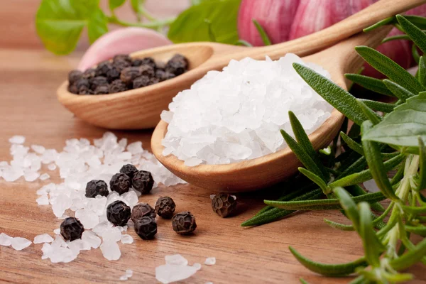 stock image Fresh herbs and salt spoon