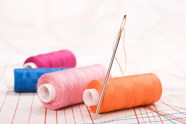 stock image Spool of thread and needle. Sew accessories.