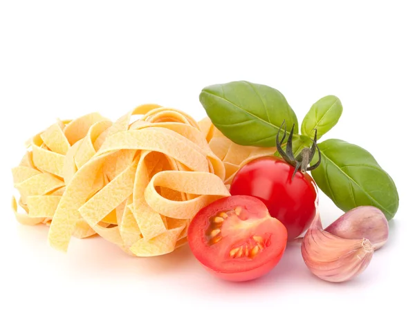 stock image Italian pasta fettuccine nest and cherry tomato