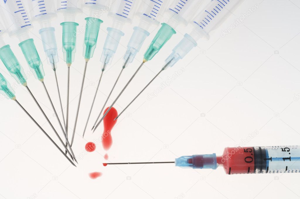 Syringes with blood drop