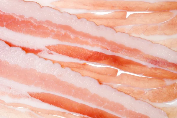 Maso slaninou potravin pozadí — Stock fotografie