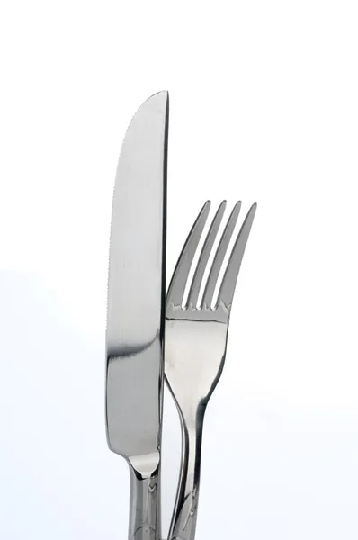 Widelec i nóż na biały — Zdjęcie stockowe