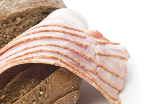 Raw bacon with bread — 图库照片