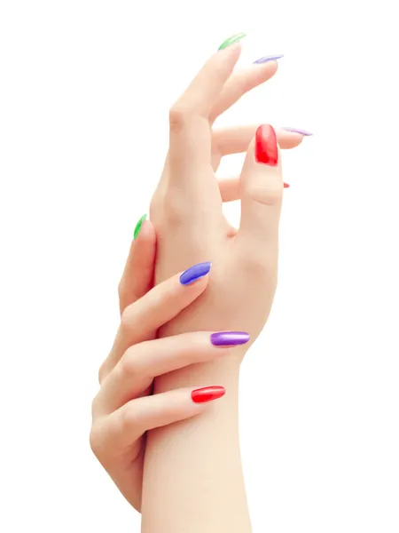 Руки с разноцветными ногтями — стоковое фото