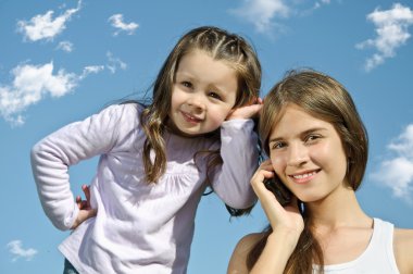 Girl talking on telephone clipart