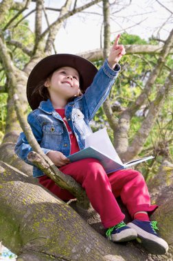 Girl reading a book clipart