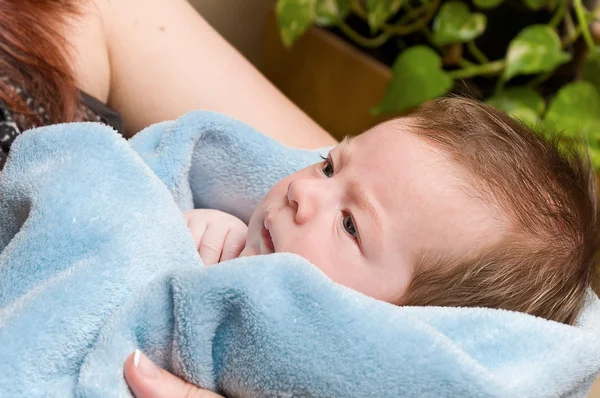 Portrait of cute little infant baby on blue — Stock Photo, Image