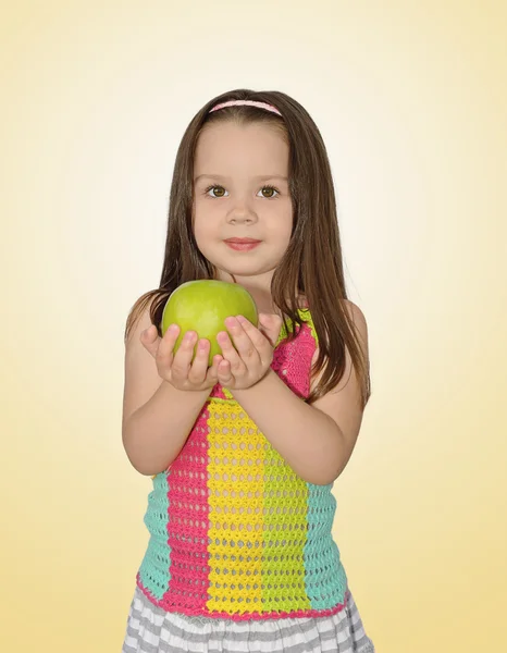 Πορτρέτο του μια όμορφη κοπέλα με πράσινο μήλο στο χέρι — Φωτογραφία Αρχείου
