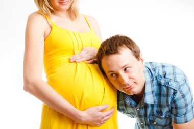 Happy family expecting their child clipart