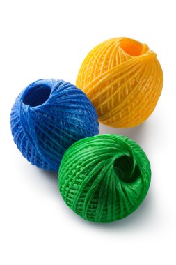 Acrylic yarn clews - green, blue and yellow clipart