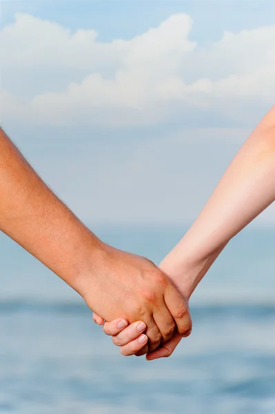 Muž a žena, držet za ruce — Stock fotografie